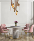 Premium Three Light Pendant Ceiling Lamp Solid Wood Design Modern Chinese Inspired Drop Light LED above pink chairs and marble table.