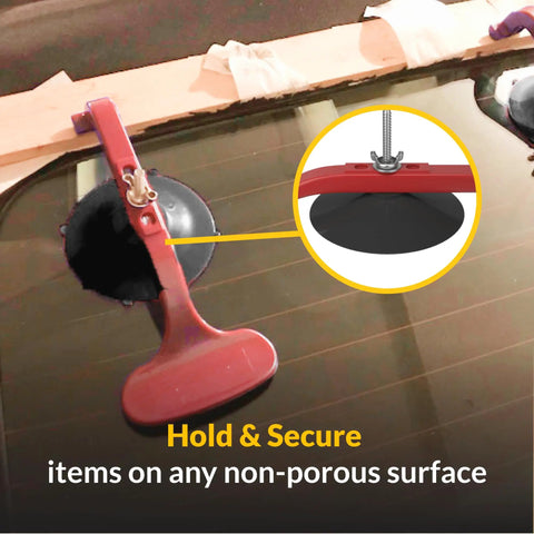 Hands Free Suck N Clamp Adjustable Cup Clamps Pack Of 6 for Windshield Repair securing a panel with suction cup.