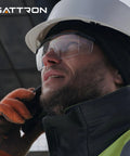 Worker wearing Clear Safety Glasses 12 Pack Polycarbonate Anti Fog Eyewear With All Day Comfort Adjustable Temples UV Protection Impact Resistant