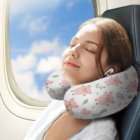 Woman on plane wearing U Shaped Neck Pillow for Travel and Office Naps, Lightweight and Reusable, Durable Polyester Cushion, Pig Cute Design