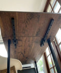 Heavy Duty Table Extension Brackets Set Of Two 26 Inch Carbon Steel Support Rails Zero Sag Design under a wooden table.
