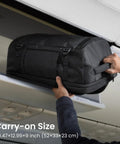 Go-To Travel Backpack 40L With Large Main Compartment And Seventeen Inch Laptop Sleeve being placed in overhead bin