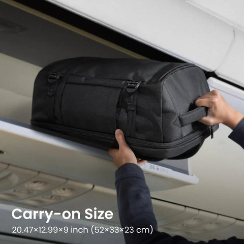 Go-To Travel Backpack 40L With Large Main Compartment And Seventeen Inch Laptop Sleeve being placed in overhead bin