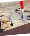 Front view of one 2 Pack Heavy Duty Iron Toggle Clamps With Rubber Tips Quick Release Welding Fixed Clamp in workshop