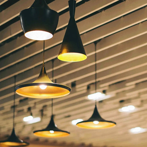 Close-up of ceiling modern pendant lights with GU24 to E26 E27 light socket adapters, showcasing their stylish design.