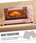 Microwave Oven Mica Sheets 10 Pieces Heat Resistant Mica Flakes Replacement Kit next to cooking oven with roasted chicken