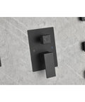 Wall Mounted Shower System with 6 Body Sprays and Hand Shower control panel in matte black finish, featuring temperature knobs.