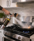 Class K Kitchen Fire Extinguisher Built For Fast Grease Cooking Flare Ups, Two Pack Of 34 Fl Oz Wet Chemical Sprayers in use.