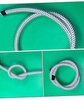 Heavy Duty High Temperature Steam Hose For Garment Steamers And Irons, Flexible PVC Nylon Replacement Tube With Universal Fit on green surface