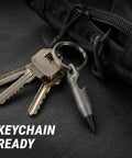Mini Pencil EDC Pendant With Infinite Keychain attached to a black bag, showcasing the compact graphite pencil for quick notes.