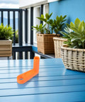 Ultimate Universal Grip Hose Reel Handle Replacement Kit, 2 Piece Heavy Duty Ergonomic Crank Knob For Outdoor Garden Pipe Repair With Weatherproof Plastic Design orange handle on blue patio table