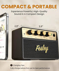 Compact 10W Bluetooth Guitar Amp For Practice With Dual Clean And Distortion Channels Rechargeable Mini Amp next to smartphone.