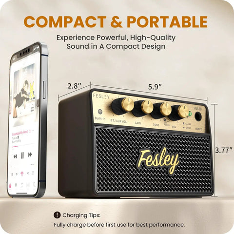 Compact 10W Bluetooth Guitar Amp For Practice With Dual Clean And Distortion Channels Rechargeable Mini Amp next to smartphone.