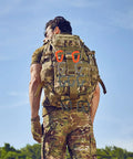 Backpack with Sixteen Pack Heavy Duty Tactical Carabiners Keychain Clips attached, outdoor setting