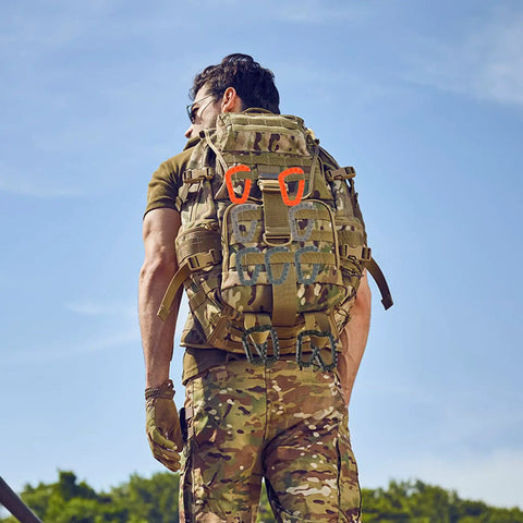 Backpack with Sixteen Pack Heavy Duty Tactical Carabiners Keychain Clips attached, outdoor setting