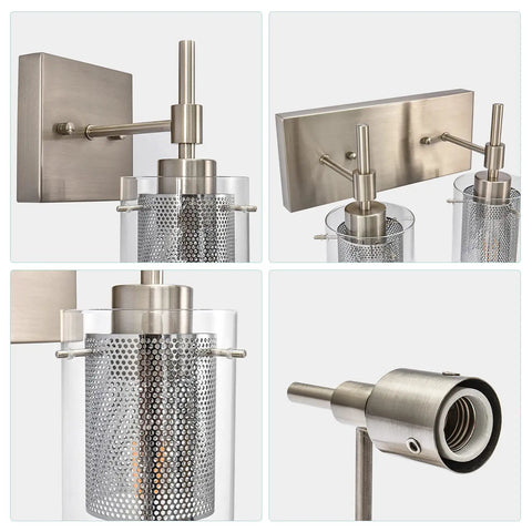 Close-up of brushed nickel vanity light fixture showing clear glass and metal mesh design with modern warm glow.
