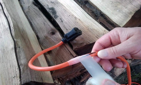 Applying Self Fusing Silicone Tape Stretch And Seal 1 Inch By 10 Feet Clear Non Adhesive That Sticks To Itself for a Quick Airtight Waterproof Seal