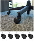 Close-up of black 2-inch office chair caster wheel; replacement 5-pack for hardwood floors and carpet
