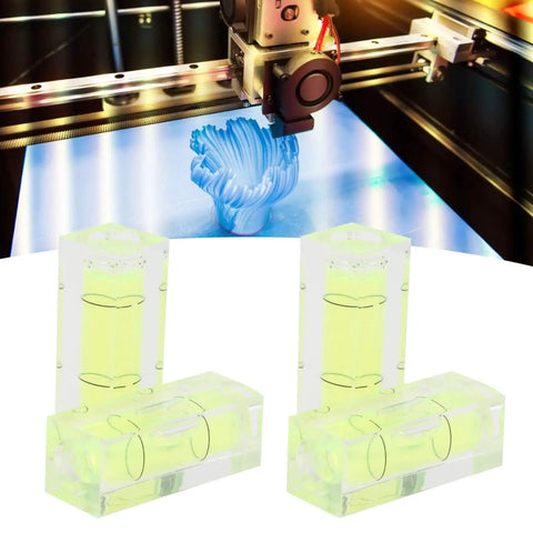 Small Spirit Level Square Bubble Level High Optical Transparency Material displayed near 3D printer, showcasing its precise measurement features.
