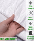 Heavy Duty 3 Mil Plastic Sheeting Roll With White Finish Measuring 3 By 100 Feet used for protecting surfaces with a hand holding it.