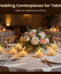 Flameless LED Tea Light Candles 24 Pack With Realistic Flicker Warm Yellow Glow on wedding table with flowers