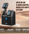 Five Point Eight Gigahertz Wireless Guitar System With Charging Case Pro Grade Dope Low Latency Clean Signal Four Channel Transmitter And Receiver Rechargeable Battery Powers Twice And Up To Six Hours For Electric Instruments JW06 in desert backdrop.