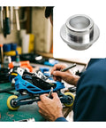 Person assembling skate using Aluminum Inline Skate Bearing Spacers Set Of 10 For 8mm Axles self centering bushings