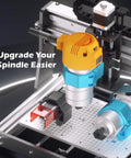 Genmitsu 3020-PRO MAX V2 CNC router front view showing orange spindle housing and blue motor mount on aluminum frame.