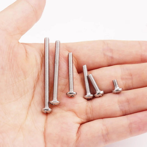 Heavy Duty Outlet Spacers And Screw Mount Kit Featuring Top Shelf Silicone And Corrosion Resistant Steel Build For A Quick Six Thirty Two Thread Fit - assortment of stainless screws in hand