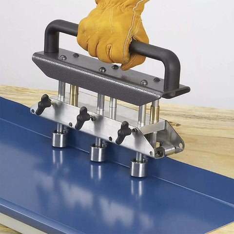 Three-Station Roller Bender for Sheet Metal 0.3-1.0 mm folding 13-130 mm with 90 degree angle in action on metal panel