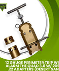 Quad 3.0 12 Gauge Perimeter Trip Alarm System With 209 And.22 Adapters in Desert Sand, shown disassembled on green background.