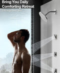 Man enjoying water from body jets and ceiling shower head of GRANDJOY 12" Ceiling Shower System with Handheld Spray, Brushed Nickel.