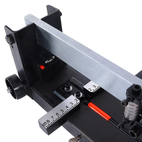 Close-up of Heavy Duty All Steel Manual Tile Cutter With Self Service Oil System And Easy Glide Wheels for precise measurements.