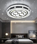 Dimmable Crystal LED Ceiling Light With Remote Control Eighteen Point Nine Inch Flush Mount Fixture 45W in modern bedroom.