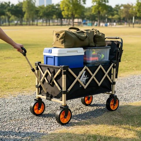 Heavy Duty Outdoor Folding Utility Wagon With 125 Liter Capacity And 600D Oxford Zero Hassle Folding Design rolls loaded with gear on a gravel path.