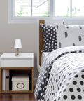 Mini Sand Nickel Table Lamp With White Fabric Shade, compact yet stylish, great for bedroom, ten point five inches tall.