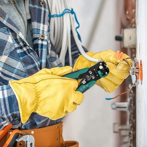 Heavy Duty Automatic Wire Stripper And Adjustable Crimping Tool being used with gloves for precise electrical wiring.