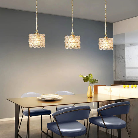 Dining room with three Dope Gold Crystal Pendant Lights With Adjustable Cord Modern Hanging Ceiling Fixture
