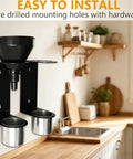 Kickass Wall Mounted Funnel Organizer Rack With Heavy Duty Iron Frame For Hella Tight Workshop Storage And Rust Resistant Industrial Shelf Brackets System mounted with black funnel and silver cups in a modern kitchen.