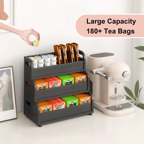 Go-To Tea Bag Organizer Rack With 3-Tier Bamboo Display next to coffee station, holds 180 plus tea bags, black finish.