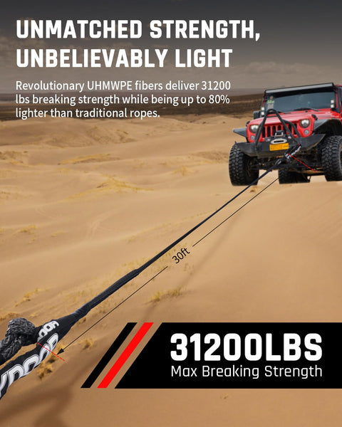 Beefy Heavy Duty Tow Rope Kit With 2 Soft Shackles For ATV UTV SUV And Truck Recovery, 7/16 Inch By 30 Feet UHMWPE Tow Strap Delivers 31,200 Lbs Break Strength, Synthetic Towing Rope For Off Road Rescue attached to a Jeep on sand.