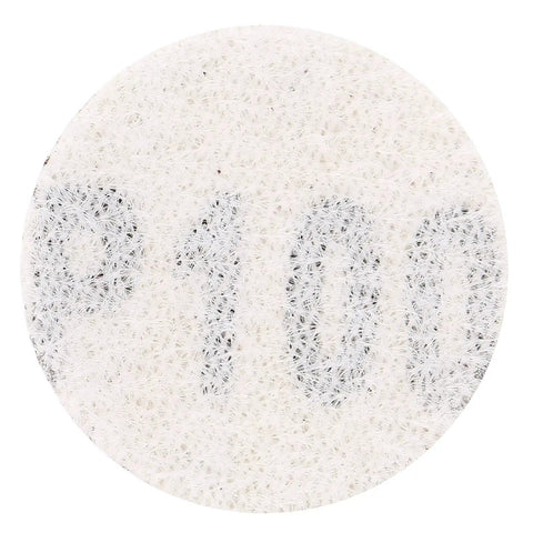 Close-up of 1 inch red sandpaper discs showing P100 grade, for wood polishing and grinding.