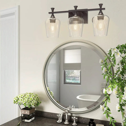 3 Light Bathroom Vanity Light Fixture With Metal Modern Frame above mirror, clear glass shades, oil-rubbed bronze finish