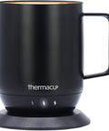 Electric Smart Coffee Mug With Led Display And Precise Temperature Control Keeps Your Daily Grinds Piping Hot Auto Shut Off Feature Three Custom Heat Settings For Flawless Sips Everywhere in sleek black ceramic design.