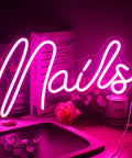 Pink Neon Sign LED Wall Light For Nail Salon And Beauty Room Decor USB Powered Neon Light Up Sign on a desk with rose