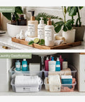 Slick Durable Portable Label Maker Machine With Wireless Bluetooth Pc App For No Sweat Home Organization And School Storage Includes Self Adhesive Tape Rolls In Green White on organized bathroom and laundry storage.