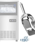 Heavy Duty Bpa Free Ice Scoop for Countertop and Under Counter Ice Makers with Easy Grip Handle next to ice maker and ice cubes.