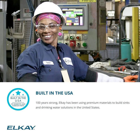 Person in safety gear at Elkay facility showcasing USA-built commercial water dispensers and sinks manufacturing.