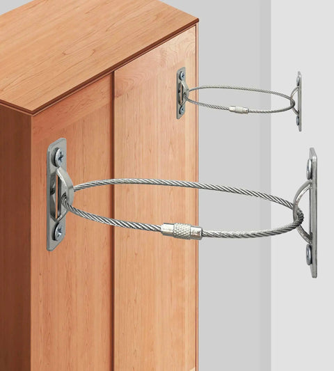 Heavy Duty Stainless Steel Anti Tip Furniture Anchors For Baby Proofing And Child Home Safety Rock Solid Earthquake Straps secured to a cabinet.