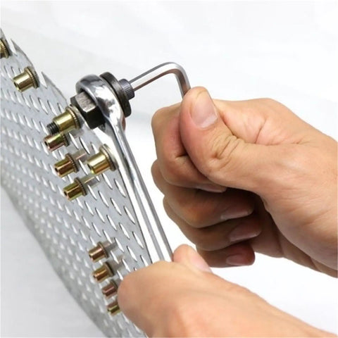 Rivet Nut Mandrel Kit With 7 Interchangeable Mandrels From M3 To M12 And 70 Galvanized Rivet Nuts For Fast Auto Body, Metalworking, License Plate Installations And Repairs. Hand using mandrel on sheet metal